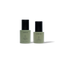 Two AMIA skincare products on a white background